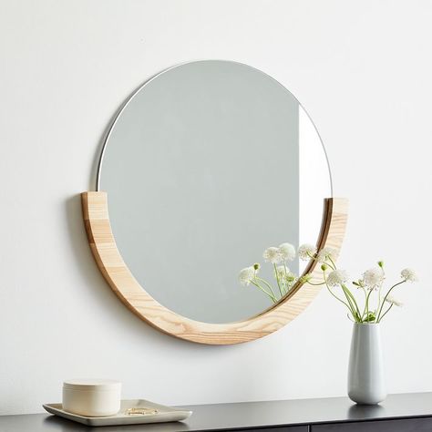 "Miroir mural rond avec cadre en bois naturel – Élégance et simplicité"